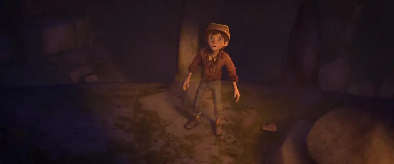Toby Johnson, en ung pojke med en hatt, står förvirrad i en mörk, stenig miljö.